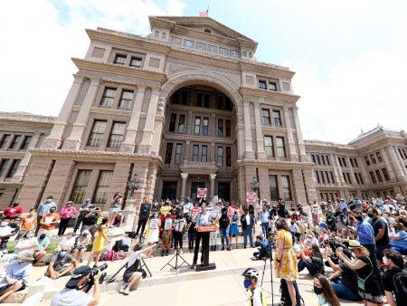 "This is a preventative measure for us," state Rep. Travis Clardy says of the Republican-backed Senate Bill 7, which sought to tighten voting rules, citing a need to prevent fraud. Here, opponents of the bill hold a rally last month at the Texas Capitol in Austin.