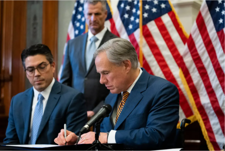 Gov. Greg Abbott signs Senate Bill 2 and Senate Bill 3 at the Texas Capitol on Tues, Jun. 8, 2022. The omnibus power grid bills will change the state’s power grid and the people who oversee it.