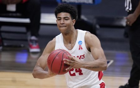 In this March 27, 2021, file photo, Houston guard Quentin Grimes passes the ball against Syracuse in the second half of an NCAA men's college basketball tournament game in Indianapolis. Grimes was selected in the first round of the NBA draft Thursday, July 29.