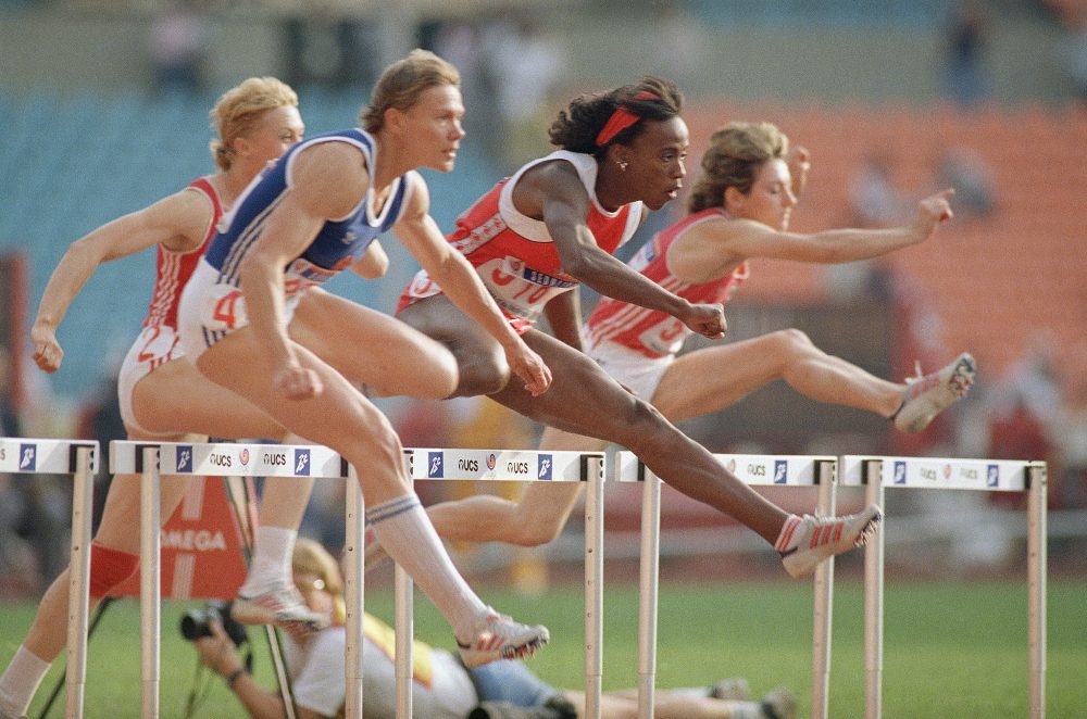 Jackie Joyner-Kersee running the hurdles (AP/Lennox McLendon)