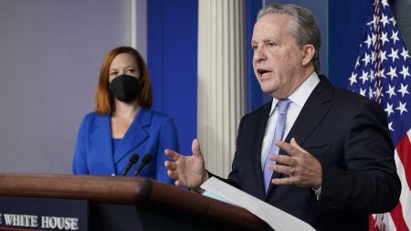 Gene Sperling, who leads the oversight for distributing funds from President Biden's $1.9 trillion coronavirus rescue package, speaks during the daily White House press briefing Monday, as White House press secretary Jen Psaki looks on.