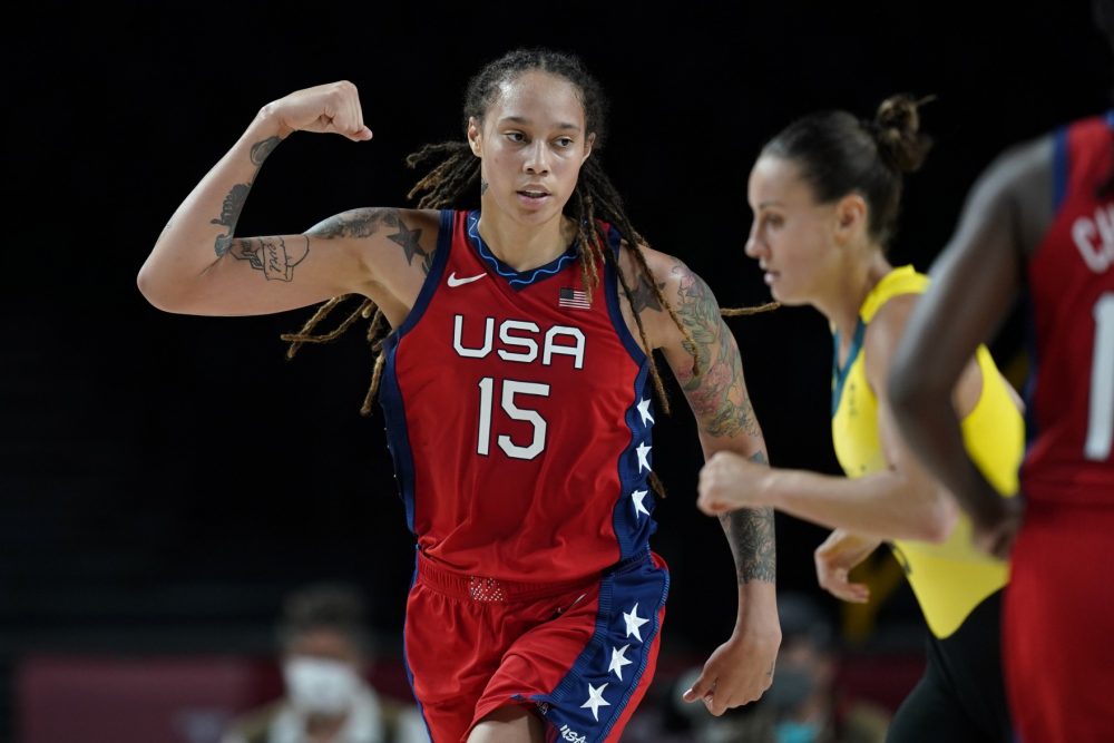 United States's Brittney Griner (15) flexes her muscle after making a basket during a women's basketball quarterfinal round game against Australia at the 2020 Summer Olympics, Wednesday, Aug. 4, 2021, in Saitama, Japan.