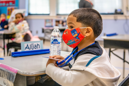 A masked student at Love Elementary School in Houston.