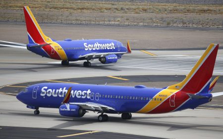 This July 17, 2019 file photo shows Southwest Airlines planes at Phoenix Sky Harbor International Airport in Phoenix. Southwest Airlines President Tom Nealon, who was once seen as a leading candidate for CEO but was passed over this year, has retired. Southwest said Monday, Sept. 13, 2021, that Nealon, 60, will still serve as an adviser focusing on environmental issues, including plans to reduce carbon emissions.