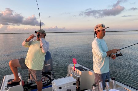 Captain L.G. Boyd and researcher Sepp Haukebo are catching fish as part of a grant to better understand what chemical pollution ends up in the bay during storms and flooding events.