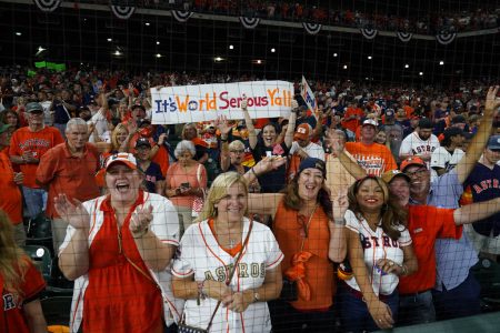 Houston Astros fans cheer after their win against the Boston Red Sox in Game 6 of baseball's American League Championship Series Friday, Oct. 22, 2021, in Houston. The Astros won 5-0, to win the ALCS series in game six.