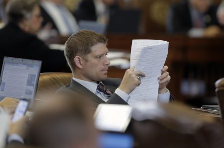 Texas Rep. Matt Krause, R-Fort Worth, looks over the calendar as law makers rush to finish business, Friday, May 26, 2017, in Austin, Texas. The current session of the Texas Legislature ends Monday.