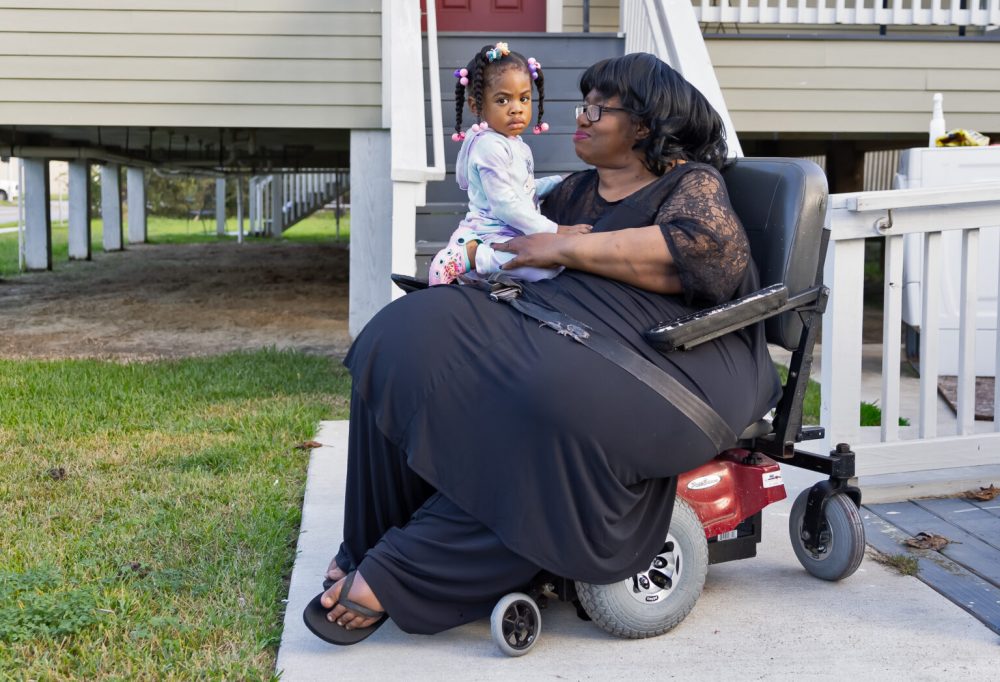 Etta Hebert, 63, and her 2-year-old great-granddaughter, Ashawti, in Hebert’s front yard in Port Arthur, Texas. Both have severe lung ailments and sometimes need breathing machines to get enough oxygen. Hebert blames air pollution, to which the Oxbow plant is an outsized contributor.