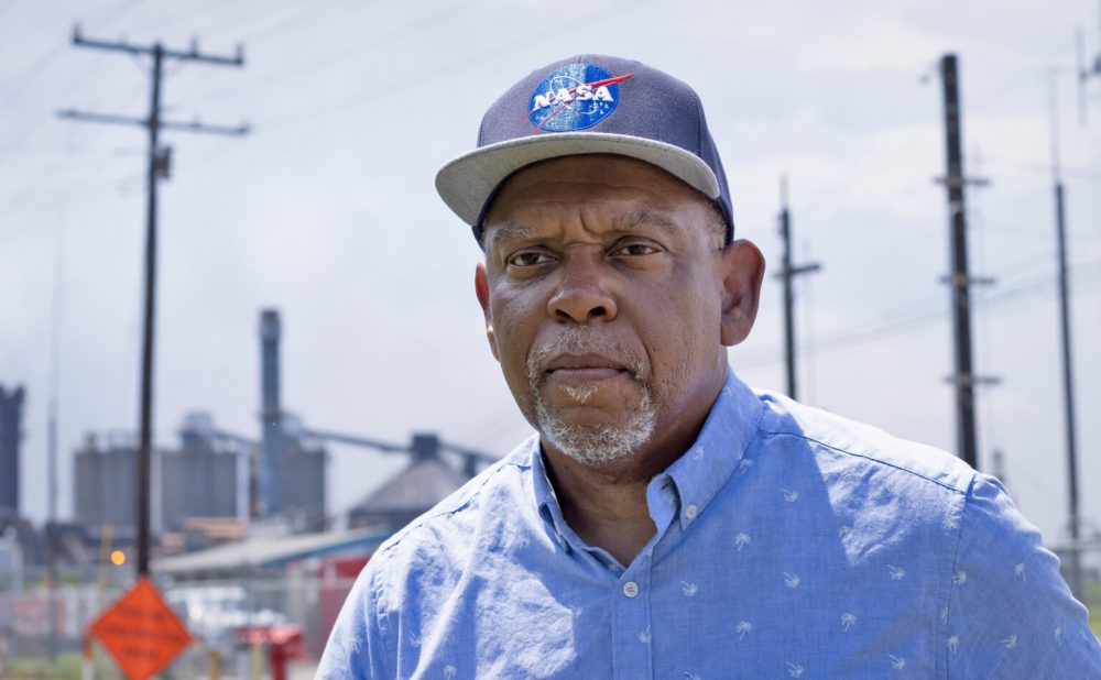 John Beard, standing in front of the Oxbow plant, is a lifelong Port Arthur resident and community activist. 