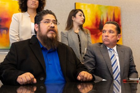 Edgar Acosta (left) talks about his son, Axel Acosta, who died during Travis Scott's Astroworld performance. Acosta sits beside attorney Tony Buzbee, who said he would file a lawsuit on behalf of Acosta’s family, along with more than 30 other plaintiffs. Photo taken on Nov. 8, 2021.