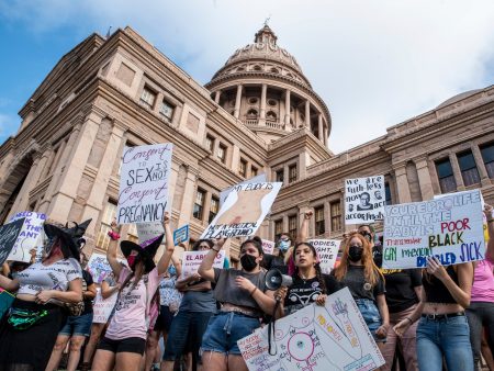 Protesters take part in the Women's March and Rally for Abortion Justice in Austin, Texas, on Oct. 2. The demonstration targeted Senate Bill 8, a state law that bans nearly all abortions as early as six weeks in a pregnancy, making no exceptions for survivors of rape or incest.