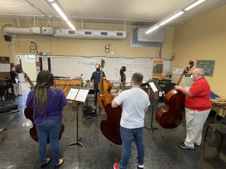 HISD Band Teachers Learning Cello From Community Embedded Musical, David Connor