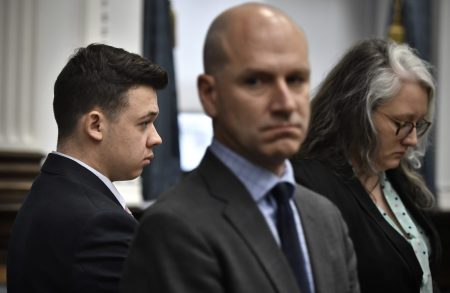 Kyle Rittenhouse, left, stands with his attorneys, Corey Chirafisi, center, and Natalie Wisco, as the jury leaves to deliberate during his trial at the Kenosha County Courthouse in Kenosha, Wis., on Tuesday, Nov. 16, 2021. Rittenhouse is accused of killing two people and wounding a third during a protest over police brutality in Kenosha, last year.