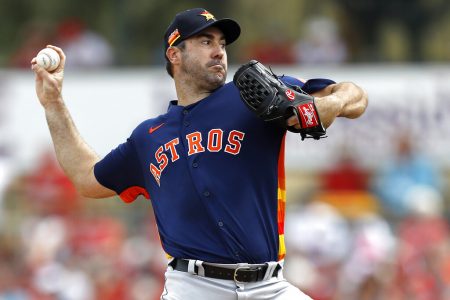 Houston Astros pitcher Justin Verlander throws to the St. Louis Cardinals during the first inning of a spring training baseball game on March 3, 2020, in Jupiter, Fla. Verlander has agreed to a $25 million, one-year contract with the Astros that includes a conditional $25 million player option for a second season.