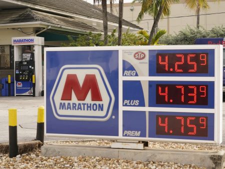 Gasoline prices on Nov. 17 in Miami Beach, Fla. The White House says oil prices have come down as speculation grew that the United States and other consumers would tap their reserves.