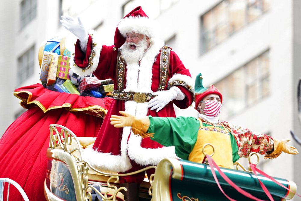 Santa Claus rides a float at the Macy's Thanksgiving Day Parade.