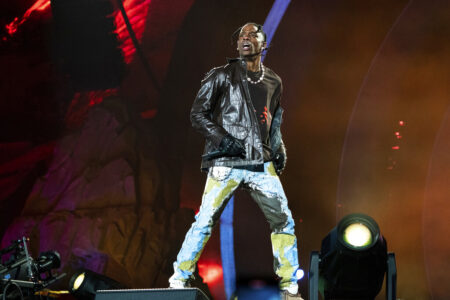FILE - Travis Scott performs at Day 1 of the Astroworld Music Festival at NRG Park on Friday, Nov. 5, 2021, in Houston. Several families of the 10 people who died from injuries in the crush of fans at the Astroworld festival have turned down an offer by headliner Scott to pay for their loved ones’ funeral costs.