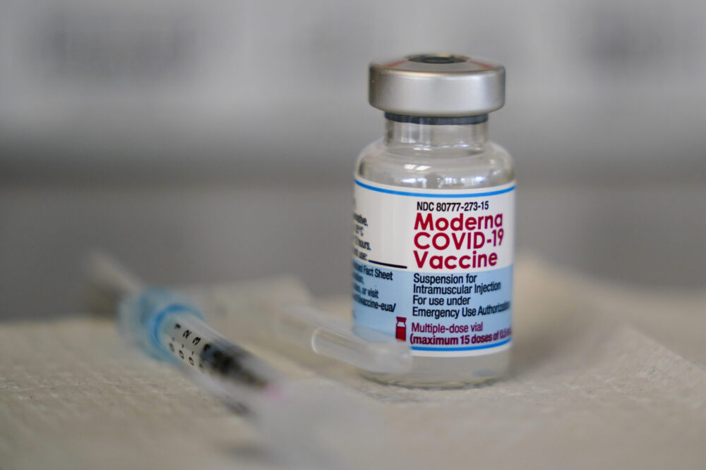 A vial of the Moderna COVID-19 vaccine is seen during a vaccination clinic at the Norristown Public Health Center in Norristown, Pa., Tuesday, Dec. 7, 2021. 