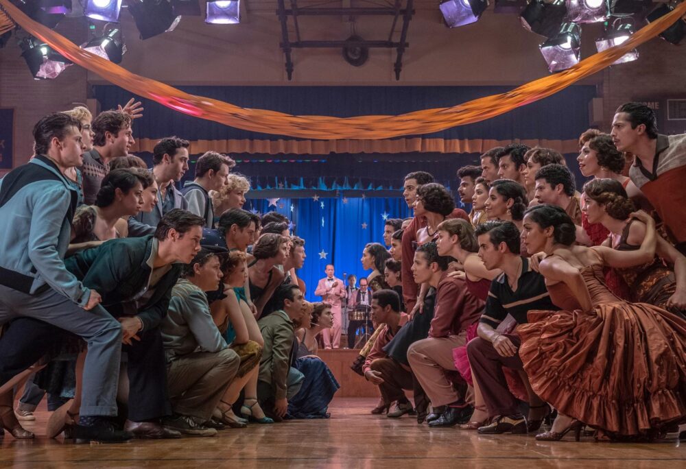 Members of the Jets and the Sharks square off at the dance in West Side Story