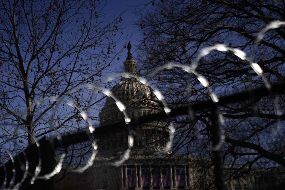 Concertina wire tops a security fencing around U.S. Capitol last year on Jan. 16, 2021 in Washington, D.C.