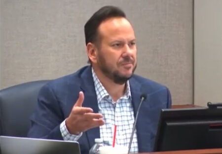 Cy-Fair ISD Trustee Scott Henry at a recent board meeting, during which he appeared to link a higher percentage of Black teachers with higher dropout rates.