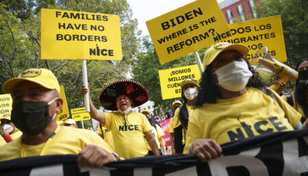 Immigration activists rally near the White House on Oct. 7, 2021. The group demonstrated for immigration reform and urged President Biden to authorize a pathway to citizenship for undocumented immigrants.