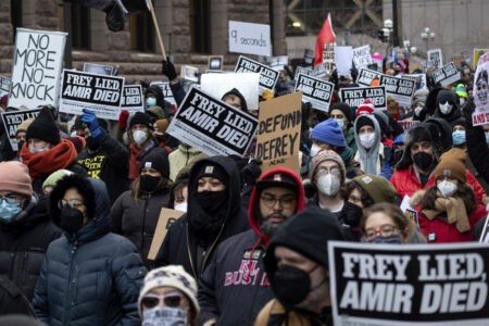 People march at a rally for Amir Locke on Saturday, Feb. 5, 2022, in Minneapolis. Hundreds of filled the streets of downtown Minneapolis after body cam footage released by the Minneapolis Police Department showed an officer shoot and kill Locke during a no-knock warrant.