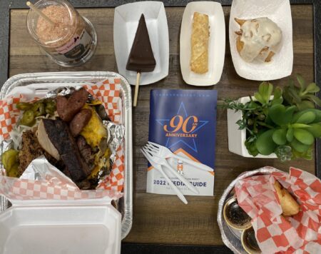 Gold Buckle Foodie Award Winners of the 2022 Houston Livestock Show & Rodeo, including: The Berry Racer Caramel Apple, Bacon Mac & Cheese Egg Roll, Fried Red Velvet Cupcake, Harlon’s All Meat Stuffed Potato and Deep Fried Jambalaya Roll