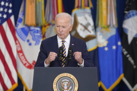 President Joe Biden behind a podium