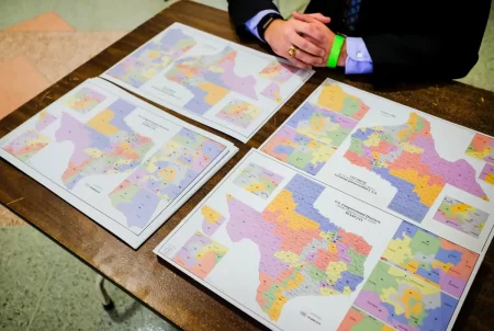 The newest drafts of the statewide congressional districts in Texas outside the Senate Chamber in the Texas Capitol in Austin on Sept. 30 2021.