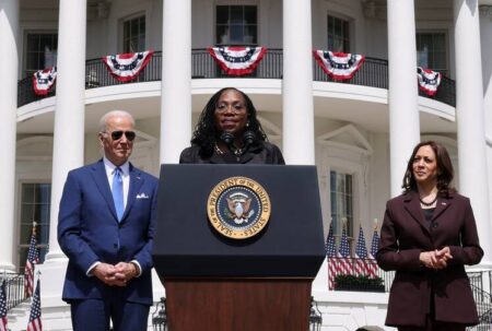 Judge Ketanji Brown Jackson delivers remarks while U.S. President Joe Biden and Vice President Kamala Harris listen during a celebration of Jackson's confirmation to the U.S Supreme Court on the South Lawn of the White House in Washington April 8, 2022. Jackson becomes the first Black woman to serve on the nation's highest court. (CNS photo/Kevin Lamarque, Reuters)
