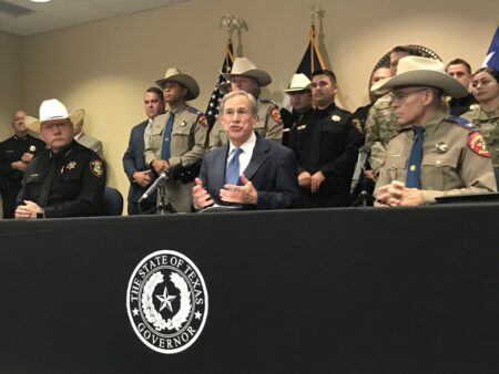 Gov. Greg Abbott, center, with Tarrant County Sheriff Bill Waybourn, left, and Texas Department of Public Safety Director Steve McCraw, warn about the dangers of fentanyl, a powerful, deadly synthetic opioid.