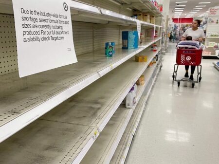 A woman shops for baby formula at Target in Annapolis, Maryland, on May 16, 2022, as a nationwide shortage of baby formula continues due to supply chain crunches tied to the coronavirus pandemic that have already strained the countrys formula stock, an issue that was further exacerbated by a major product recall in February. (Photo by Jim WATSON / AFP) (Photo by JIM WATSON/AFP via Getty Images)