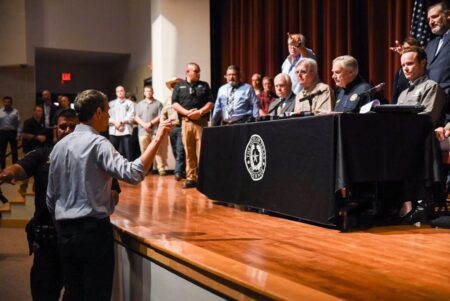 Democratic gubernatorial candidate Beto O'Rourke confronts Gov. Greg Abbott at a Wednesday press conference in Uvalde the day after a gunman killed 19 children and two adults at Cobb Elementary on May 24, 2022.