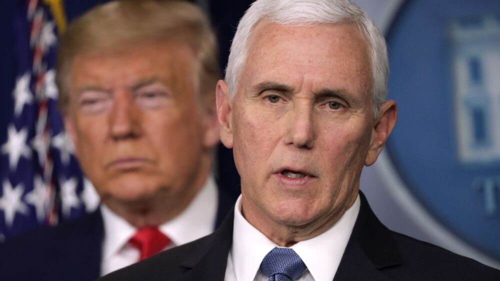 Then-President Donald Trump listens as then-Vice President Mike Pence speaks during a news conference at the White House in February 2020 in Washington, DC.