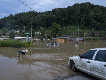 JACKSON, KY - JULY 28: Vehicles are seen in floodwaters downtown on July 28, 2022 in Jackson, Kentucky. Storms that dropped as much as 12 inches of rain in some parts of Eastern Kentucky have caused devastating floods in some areas and have claimed at least eight lives. (Photo by Michael Swensen/Getty Images)