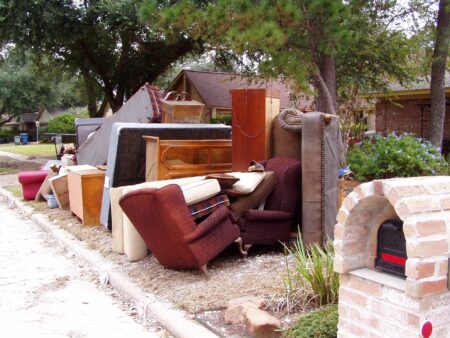 Ruined furniture from Cook's former home, awaiting removal.