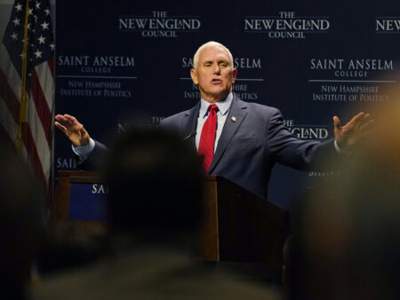 Former Vice President Mike Pence gestures during the "Politics and Eggs" breakfast gathering, Wednesday, Aug. 17, 2022, in Manchester, N.H. (AP Photo/Charles Krupa)