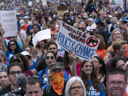 People participate in the second March for Our Lives rally in support of gun control Saturday, June 11, 2022, in Washington. The rally is a successor to the 2018 march organized by student protestors after the mass shooting at a high school in Parkland, Fla. (AP Photo/Jose Luis Magana)