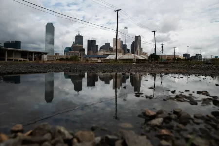 An undeveloped portion of land near the proposed site of a bullet train station outside downtown Dallas on Thursday, Aug. 25, 2022. The developer of the high-speed rail line has faced a leadership exodus this year.