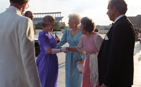 Queen Elizabeth II is greeted by then-Texas Gov. Ann Richards and former First Lady Lady Bird Johnson.