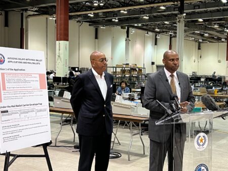 Harris County Commissioner Rodney Ellis (left) and Harris County Election Administrator Clifford Tatum (right) announce changes to the election process for the upcoming midterm elections.