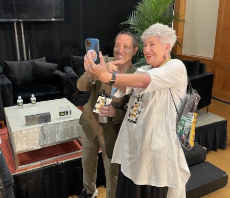 Texas Republican comptroller Glenn Hegar and Democrat Janet Dudding take a selfie at The Texas Tribune Festival in Austin on September 23, 2022.