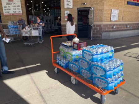 Customers purchase packs of water by the cartful at Costco on Richmond Ave. after the city issued a boil water notice on Sunday, November 12, 2022.