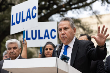 Dr. Sergio Lira, LULAC Redistricting Committee Chair, discusses a federal lawsuit against the city of Houston outside of City Hall on Dec. 5, 2022.