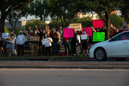 Demonstrators gathered outside the Harris County Courthouse in Houston on Aug. 21, 2020, to protest evictions. A new Texas Housers report found that differences in staffing, political support and community outreach impacted how effective cities and counties were in distributing federal funds to assist renters during the pandemic.