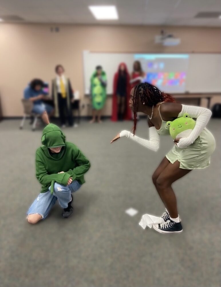 Neveah Gregory and Andi Ingram dress as the Princess and the Frog at Cinco Ranch GSA's Halloween social and costume contest.