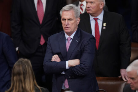 Rep. Kevin McCarthy, R-Calif., listens during the twelfth round of voting in the House chamber as the House meets for the fourth day to elect a speaker and convene the 118th Congress in Washington, Friday, Jan. 6, 2023. (AP Photo/Alex Brandon)