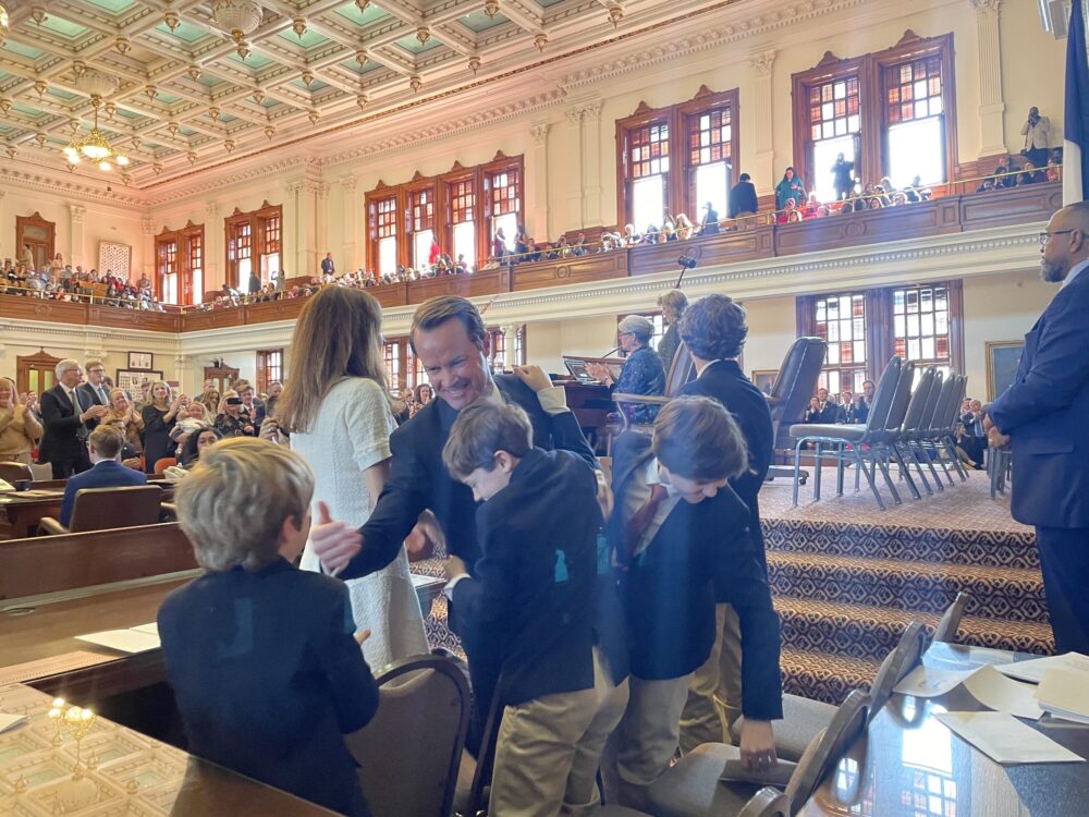 Rep. Dade Phelan, R-Beaumont, hugs his family after being reelected speaker of the Texas House of Representatives on Tuesday.