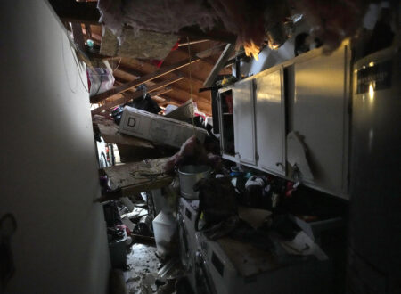 Storm damage is shown inside the home of Manuel Mendez Tuesday, Jan. 24, 2023, in Pasadena, Texas. A powerful storm system took aim at Gulf Coast Tuesday, spawning tornados that caused damage east of Houston. (AP Photo/David J. Phillip)